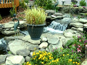 Side view of the waterfalls to the lower pond